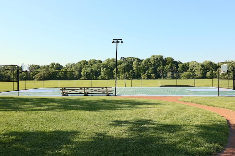 A regulation-sized basketball court has been built a few steps outside the gym’s French doors. Toptenrealestatedeals.com
