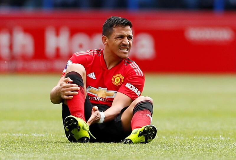 Soccer Football - Premier League - Huddersfield Town v Manchester United - John Smith's Stadium, Huddersfield, Britain - May 5, 2019  Manchester United's Alexis Sanchez reacts after sustaining an injury     Action Images via Rceuters/Jason Cairnduff  EDITORIAL USE ONLY. No use with unauthorized audio, video, data, fixture lists, club/league logos or "live" services. Online in-match use limited to 75 images, no video emulation. No use in betting, games or single club/league/player publications.  Please contact your account representative for further details.