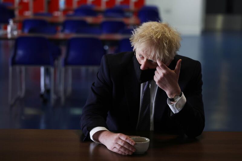 LONDON, ENGLAND - APRIL 29:  Prime Minister Boris Johnson speaks with pupils after taking part in a science lesson at King Solomon Academy in Marylebone, on April 29, 2021 in London, England. (Photo by Dan Kitwood - WPA Pool/Getty Images)