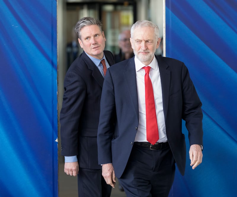 Mr Starmer and then-Labour leader Jeremy Corbyn talk to the media at the EU Commission headquarters in March 2019 in Brussels. Getty Images