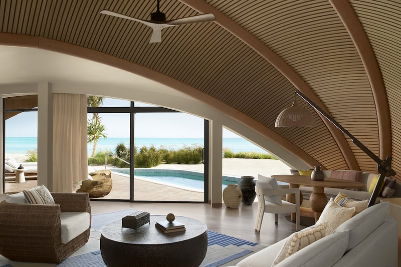 Every villa has panoramic windows and a private pool