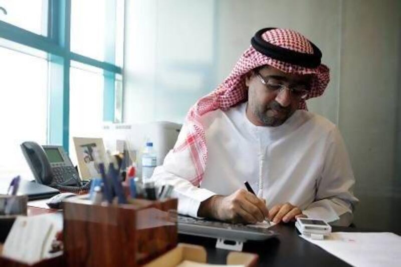 Dr. Jamal Al Mutawa with Health Authority Abu Dhabi monitors the number of sick notices doctors issue each year. Sammy Dallal / The National