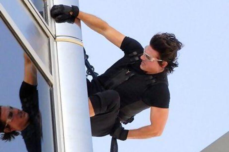 The actor Tom Cruise scales the Burj Khalifa during the filming of Mission: Impossible - Ghost Protocol. Last year 19 films were shot in Dubai, generating $10m for the economy. Express Newspapers via AP Images