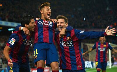 FILE - In this Sunday, Jan. 11, 2015 file photo, FC Barcelona's Lionel Messi, right, Neymar, center, and Luis Suarez, celebrate after scoring against Atletico Madrid during a Spanish La Liga soccer match at the Camp Nou stadium in Barcelona, Spain. Barcelona said, Wednesday, Aug. 2, 2017, Neymar's 222 million euro ($262 million) release clause must be paid in full if the Brazil striker wants to leave. (AP Photo/Siu Wu, File)