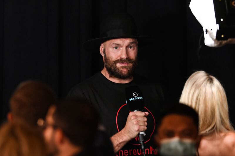 Tyson Fury speaks at the weigh-in. EPA