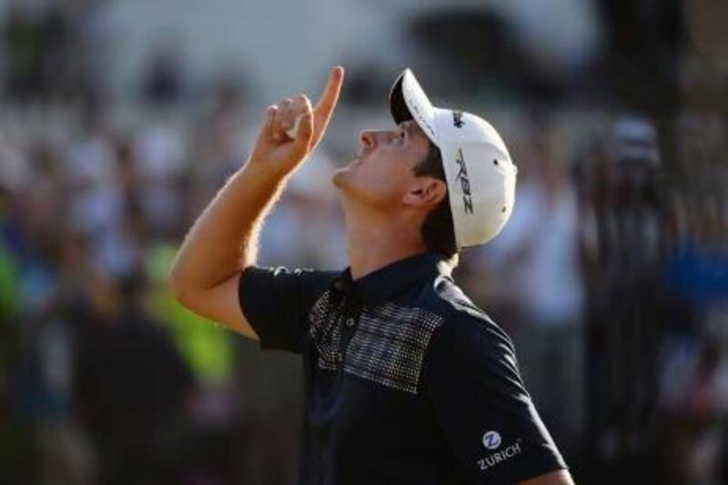 England’s Justin Rose looks to the heavens in acknowledgement of his deceased father after putting on the 18th hole to win the US Open at Merion Golf Club.