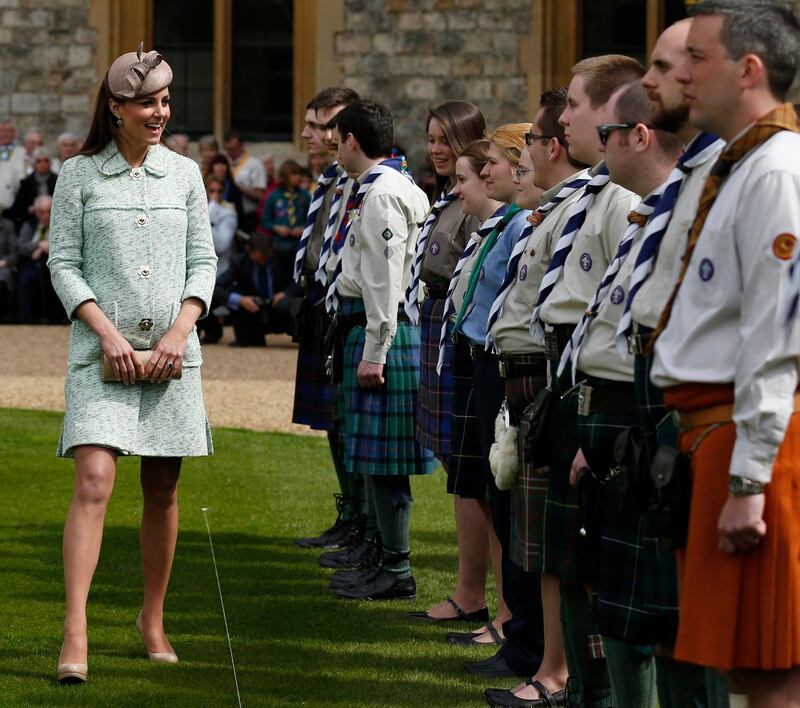 WINDSOR, UNITED KINGDOM - APRIL 21:  Catherine, Duchess of Cambridge meets with scouts as she attends the National Review of Queen's Scouts at Windsor Castle on April 21, 2013.  (Photo by Olivia Harris - WPA Pool/Getty Images)
