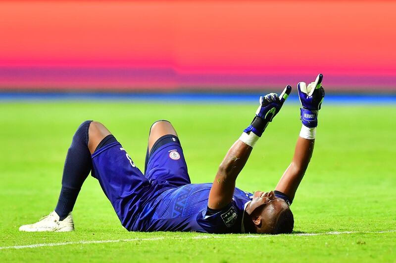 Madagascar goalkeeper Melvin Adrien celebrates at the final whistle. Madagascar reached the last 16 at what is their first ever appearance at an Africa Cup of Nations tournament. AFP