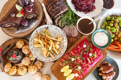 Friday brunches will go ahead as planned for Christmas and New Year's Eve. Seen here, dishes on offer at the Christmas brunch at Conrad Abu Dhabi Etihad Towers. 