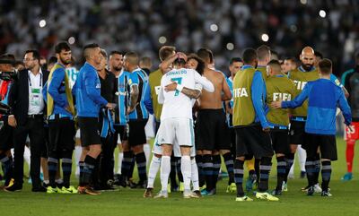 Soccer Football - FIFA Club World Cup Final - Real Madrid vs Gremio FBPA - Zayed Sports City Stadium, Abu Dhabi, United Arab Emirates - December 16, 2017   Real Madrid’s Cristiano Ronaldo and Marcelo celebrate winning the FIFA Club World Cup      REUTERS/Matthew Childs