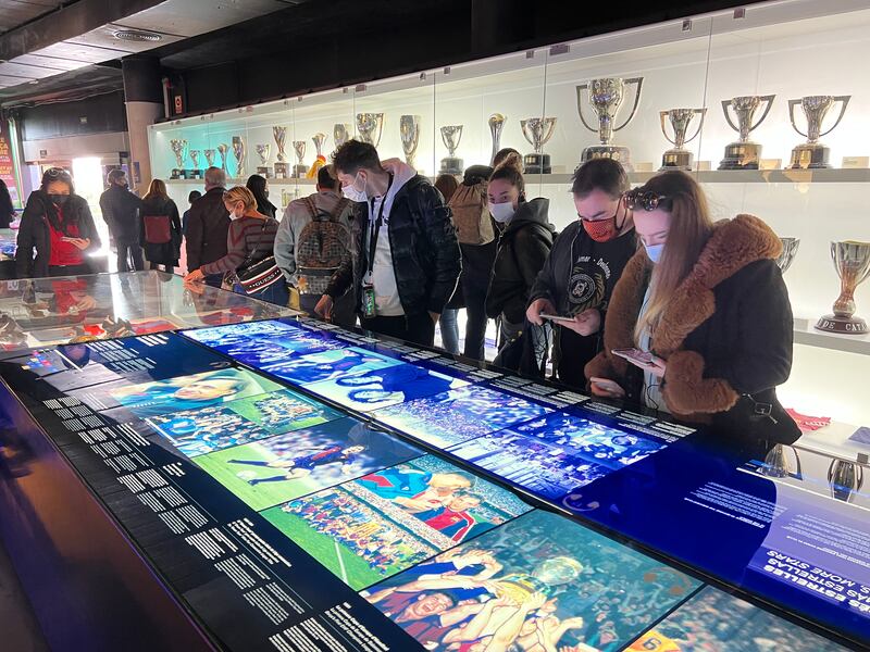 Visitors touring the FC Barcelona museum at Camp Nou, which is undergoing renovation to incorporate new technologies, in downtown Barcelona. The venue also offers virtual tours. Alvin R. Cabral / The National