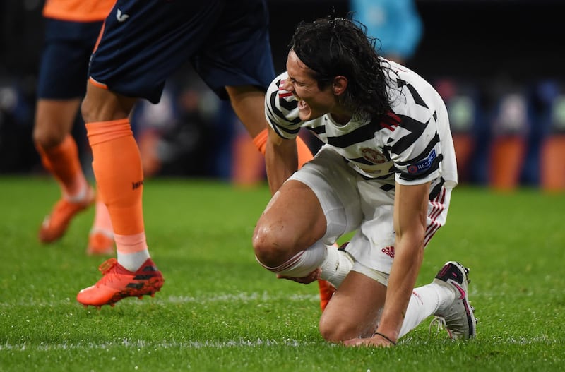 Edinson Cavani of Manchester United goes down injured. Getty