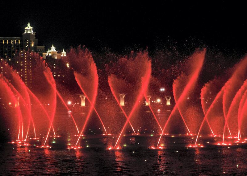 DUBAI, UNITED ARAB EMIRATES. 18 NOVEMBER 2020. 
The Palm Fountain comes alive to the theme of Oman National Day on 18 November. 
(Photo: Reem Mohammed/The National)

Reporter:
Section: