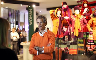 Alessandro Benetton, chairman of Benetton Group SpA, speaks during a television interview at the company's store on Brompton Road in London, U.K., on Tuesday, Sept 18, 2012. Benetton Group SpA, the family-owned Italian fashion company, will replace controversial posters showing world leaders kissing with an advertising campaign that highlights rising levels of youth unemployment. Photographer: Chris Ratcliffe/Bloomberg *** Local Caption *** Alessandro Benetton