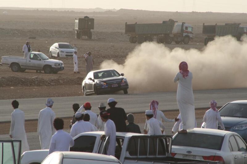 Young Saudis gather to watch joyriding, an illegal activity that Pascal Menoret says is a reaction to the restrictive social milieu. Courtesy The Best