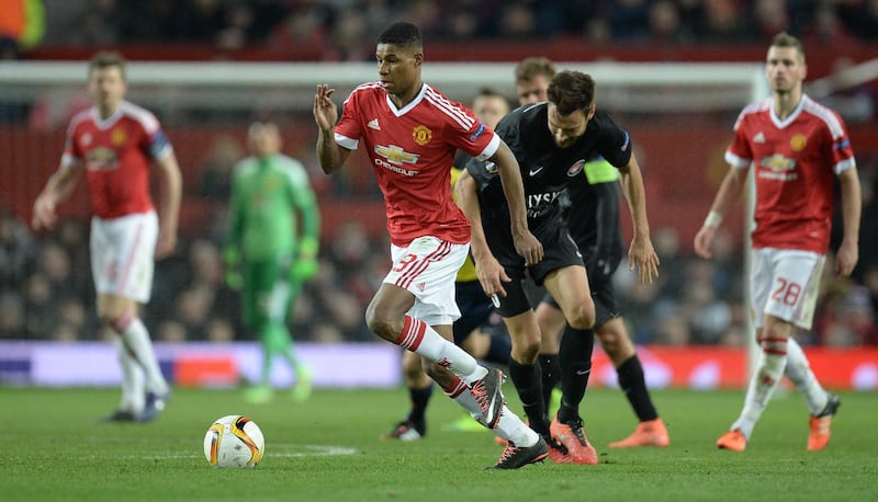 Manchester United's English striker Marcus Rashford controls the ball during the UEFA Europa League round of 32, second leg football match between Manchester United and and FC Midtjylland at Old Trafford in Manchester, north west England, on February 25, 2016. - Manchester United won the match 5-1. (Photo by OLI SCARFF / AFP)
