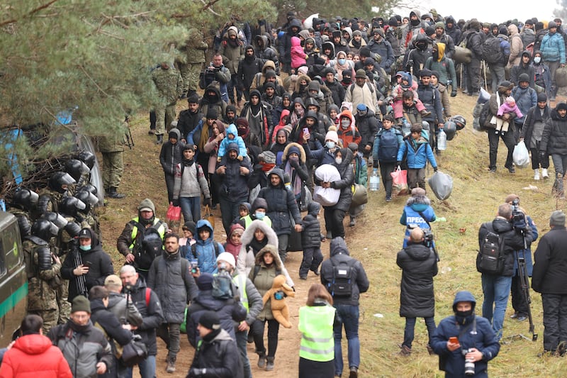Migrants gather near the Polish border in Kuznica. AFP