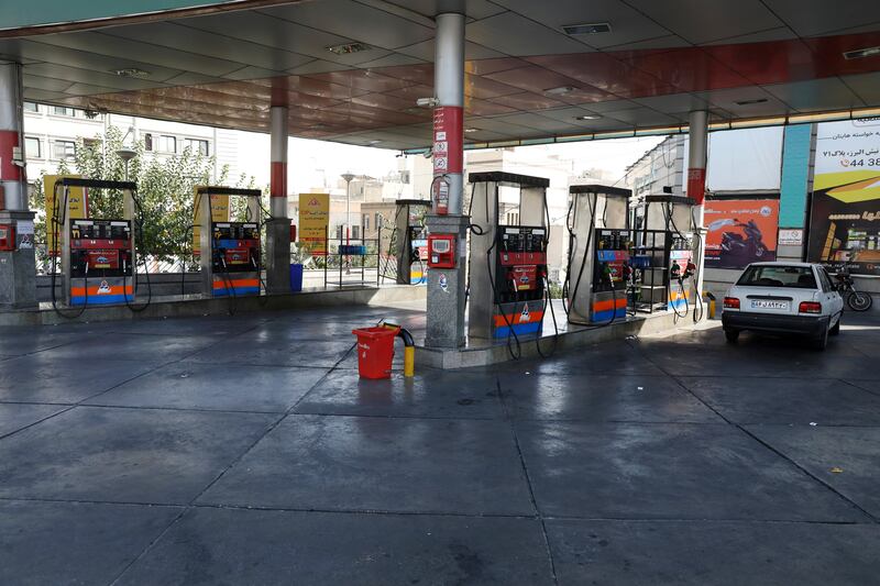A gas station lies empty because the petrol pumps were out of service, in Tehran on Tuesday. AP