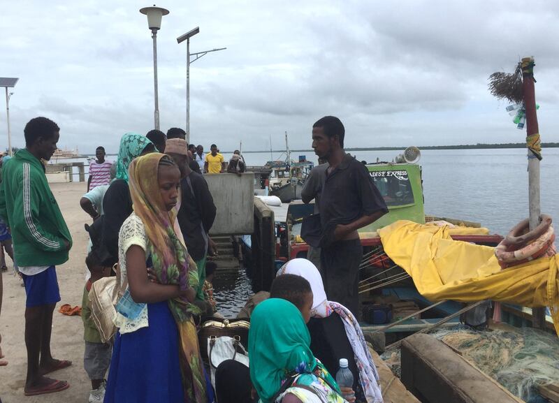 Travellers gather at the Lamu jetty following an attack by Al Shabab militants on the military base in Manda. Reuters