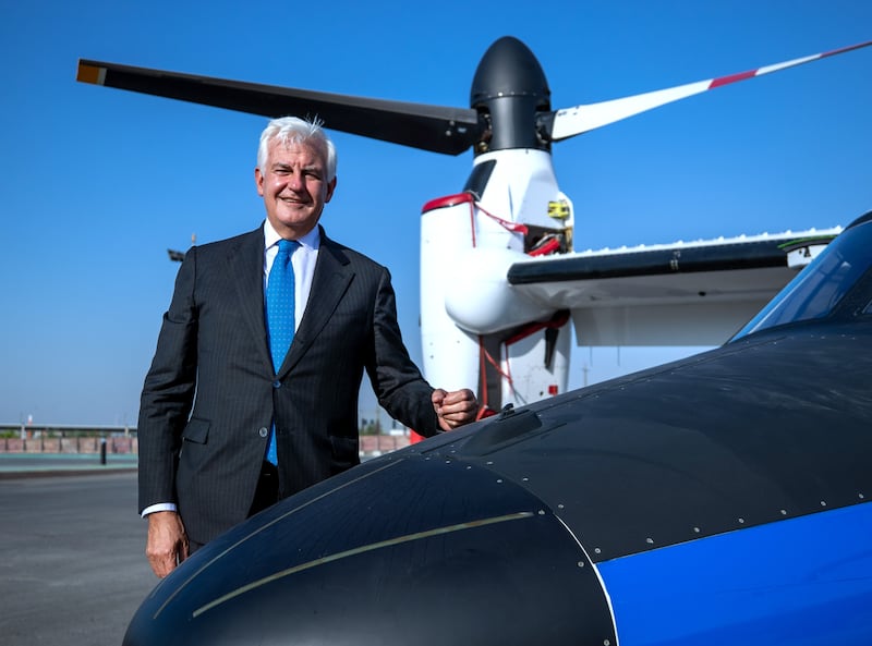 Alessandro Profumo, CEO of Leonardo at the Expo 2020 Dubai helicopter terminal with the AW609 TiltRotor aircraft. Victor Besa/The National.