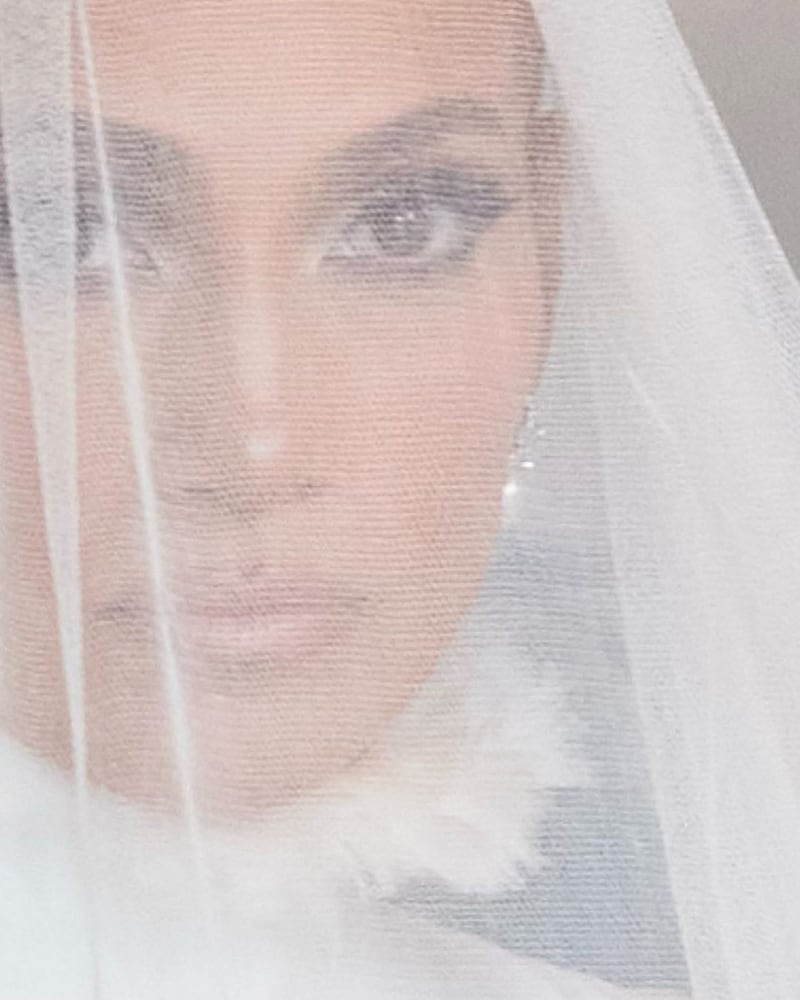 A close-up look at Lopez behind her veil, wearing a turtleneck gown by Ralph Lauren. Photo: Jennifer Lopez / Instagram