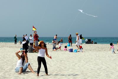 ABU DHABI - UNITED ARAB EMIRATES - 16 DEC 2016 - Participants enjoy the operation smile kite festival and Family Fun Day at Saadiyat Public Beach by Flying Kites and treasure hunts for kids yesterday in Abu Dhabi. Ravindranath K / The National ID: 75203 (Standalone for News ) *** Local Caption ***  RK1612-standalone04.jpg