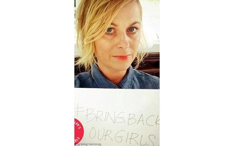 Amy Poehler holds up a #BringBackOurGirls sign in support of the Nigerian schoolgirls. Courtesy Amy Poehler