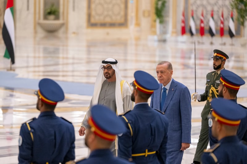 President Sheikh Mohamed and Mr Erdogan inspect the UAE Honour Guard. Photo: UAE Presidential Court