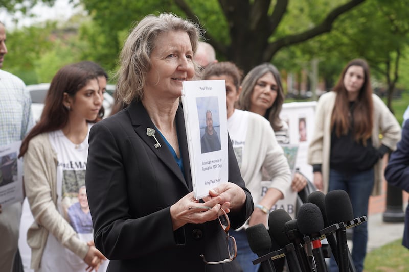 Elizabeth Whelan holds a picture of her brother Paul who is imprisoned in Russia. Willy Lowry / The National