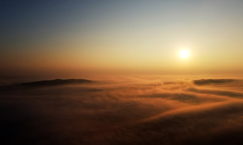 Early morning fog in the desert in Al Badayer, Sharjah. Pawan Singh / The National