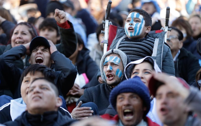 Argentina's fans react in frustration during a televised broadcast of the Croatia vs Argentina World Cup match, in Buenos Aires. Jorge Saenz / AP Photo