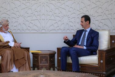 Oman’s Foreign Minister Yusuf bin Alawi, left, meets Syrian President Bashar Al Assad in Damascus on July 7. AP/SANA