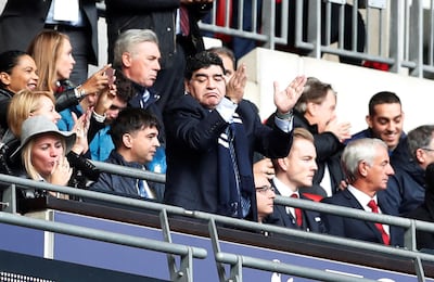 Soccer Football - Premier League - Tottenham Hotspur vs Liverpool - Wembley Stadium, London, Britain - October 22, 2017   Diego Maradona applauds after Tottenham's Harry Kane scores their first goal    Action Images via Reuters/Matthew Childs    EDITORIAL USE ONLY. No use with unauthorized audio, video, data, fixture lists, club/league logos or "live" services. Online in-match use limited to 75 images, no video emulation. No use in betting, games or single club/league/player publications. Please contact your account representative for further details.