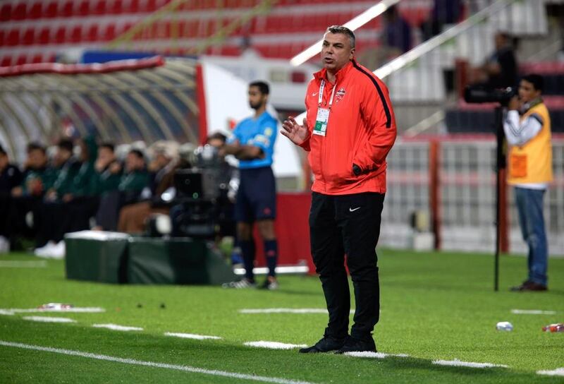 Cosmin Olaroiu felt mixed following Al Ahli's victory over Al Shaab in the President's Cup quarter-finals on Friday night. Jeffrey E Biteng / The National