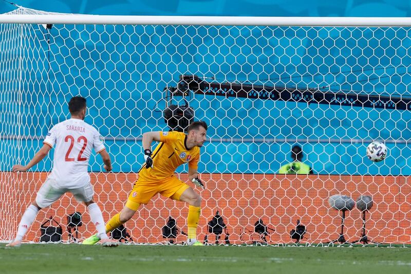 Spain's midfielder Pablo Sarabia scores his team's third goal. AFP