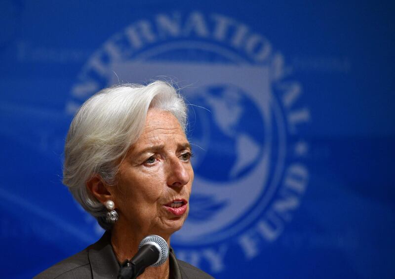 (FILES) In this file photo taken on October 4, 2018 International Monetary Fund (IMF) managing director Christine Lagarde speaks during a press conference in Tokyo. The impact of escalating trade tensions on global growth are worse than feared just one month ago, and threatened US auto tariffs could cut a large chunk out of the world economy, the IMF warned on November 27, 2018. The International Monetary Fund just last month alerted the dangers of growing frictions -- notably between the United States and China. / AFP / Kazuhiro NOGI
