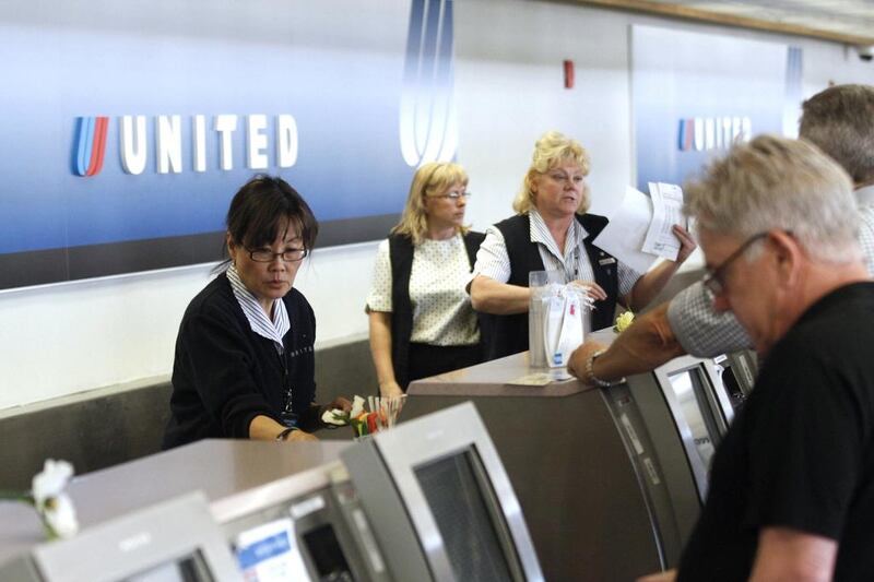 Frequent flyer miles add up for passengers. Joshua Lott / Reuters