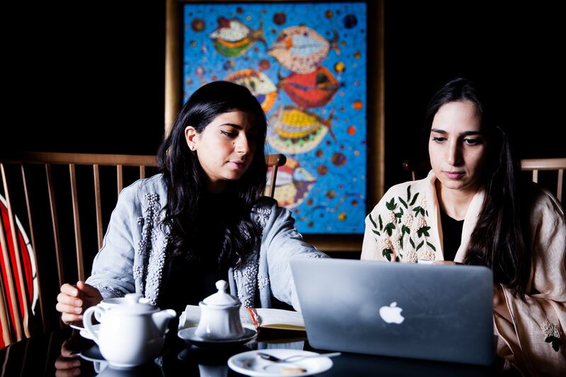 Noura and Basma Bouzo, the siblings behind Saudi Design Week, at work in a coffee shop in Riyadh.