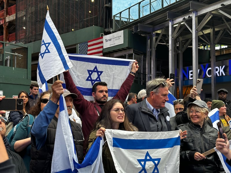 Pro-Israeli and pro-Palestinian demonstrators held opposing rallies in New York's Times Square on Sunday. Adla Massoud / The National