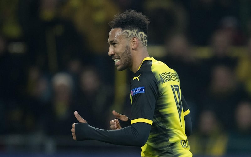 (FILES) This file photo taken on November 21, 2017 shows then Dortmund's Gabonese forward Pierre-Emerick Aubameyang celebrating scoring the opening goal during the UEFA Champions League Group H football match BVB Borussia Dortmund v Tottenham Hotspur at the BVB Stadion in Dortmund, western Germany.
Pierre-Emerick Aubameyang has joined Arsenal after the Gunners agreed terms with his former team Borussia Dortmund, both clubs confirmed Wednesday, January 31, 2018. / AFP PHOTO / dpa / Bernd Thissen / Germany OUT