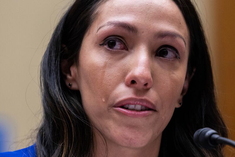 Ana Nunez, former co-ordinator of business development and client service, and account executive for Washington's NFL team was overcome with emotion as she testified. AP