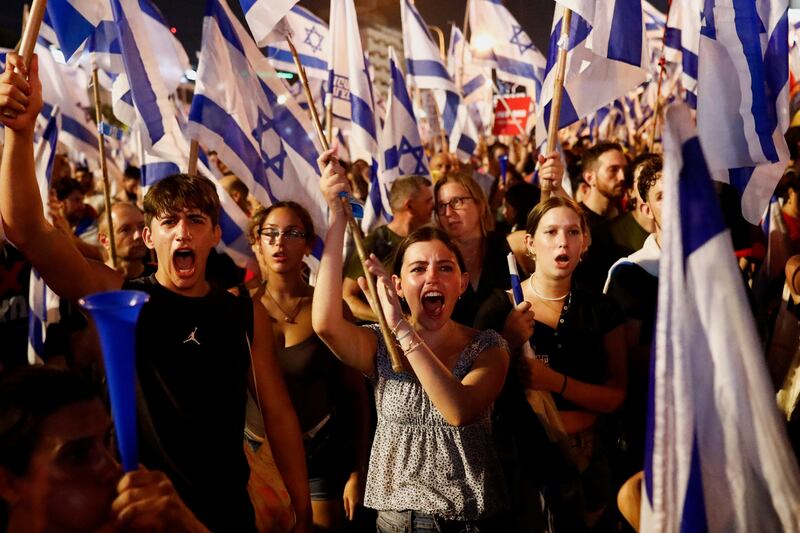 People take part in a demonstration against Israeli Prime Minister Benjamin Netanyahu and his nationalist coalition government's judicial overhaul in Tel Aviv on Saturday. Reuters