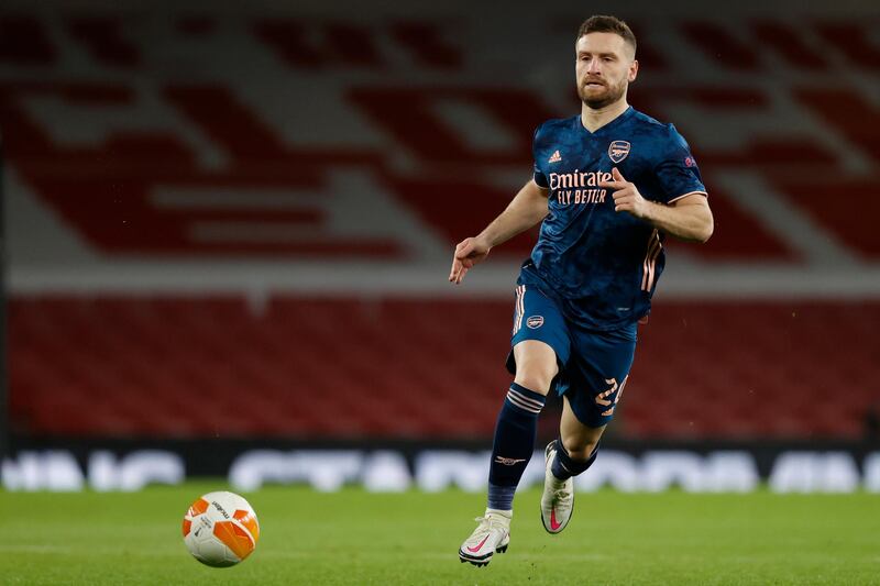 Arsenal's German defender Shkodran Mustafi runs with the ball during the UEFA Europa League 1st Round Group B football match between Arsenal and Rapid Vienna at the Emirates Stadium in London on December 3, 2020. (Photo by Adrian DENNIS / AFP)