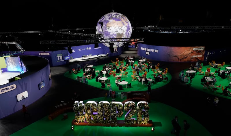 People gather in the Action Zone inside the venue of the Cop26 summit in Glasgow, Scotland. AP Photo