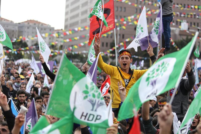 People wave pro-Kurdish Peoples' Democratic Party (HDP) flags during a gathering to celebrate Newroz, which marks the arrival of spring and the new year, in Istanbul, Turkey March 24, 2019. REUTERS/Mesude Bulbul NO RESALES. NO ARCHIVES