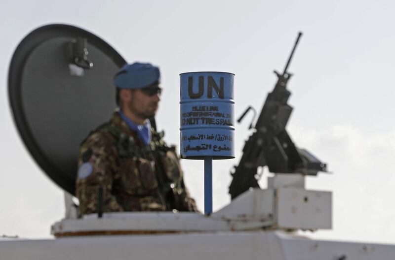 Soldiers form the Italian contingent in the UNIFIL patrol the blue line in Lebanon's southern border town of Naqura on the border with Israel, south of Beirut, on February 24, 2018.
The UN peacekeeping force in southern Lebanon has made efforts to prevent tension between Lebanon and Israel from escalating into a conflict, warning of continued escalation on the backdrop of oil exploration and construction of a barrier on the border. / AFP PHOTO / JOSEPH EID