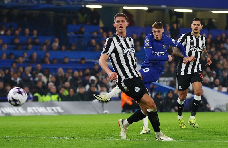 Cole Palmer shoots to score Chelsea's second goal against Newcastle. Reuters
