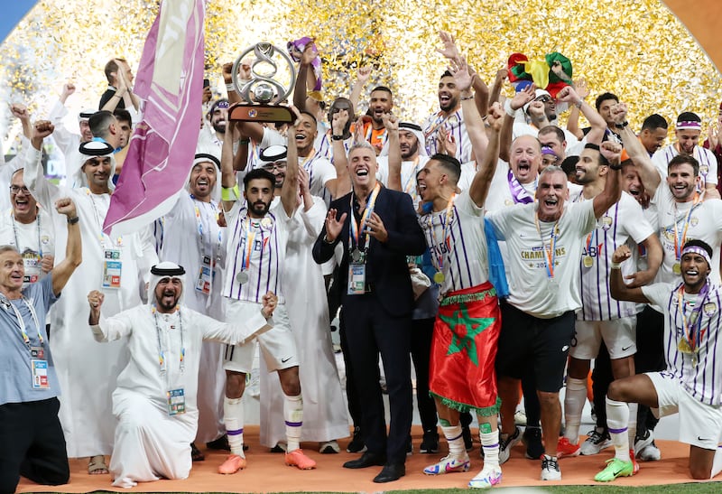 Al Ain players and coaching staff celebrate after beating Yokohama F Marinos to win the AFC Champions League on May 25, 2024. Al Ain won 5-1 at Hazza Bin Zayed Stadium and 6-3 on aggregate. All images: Chris Whiteoak / The National
