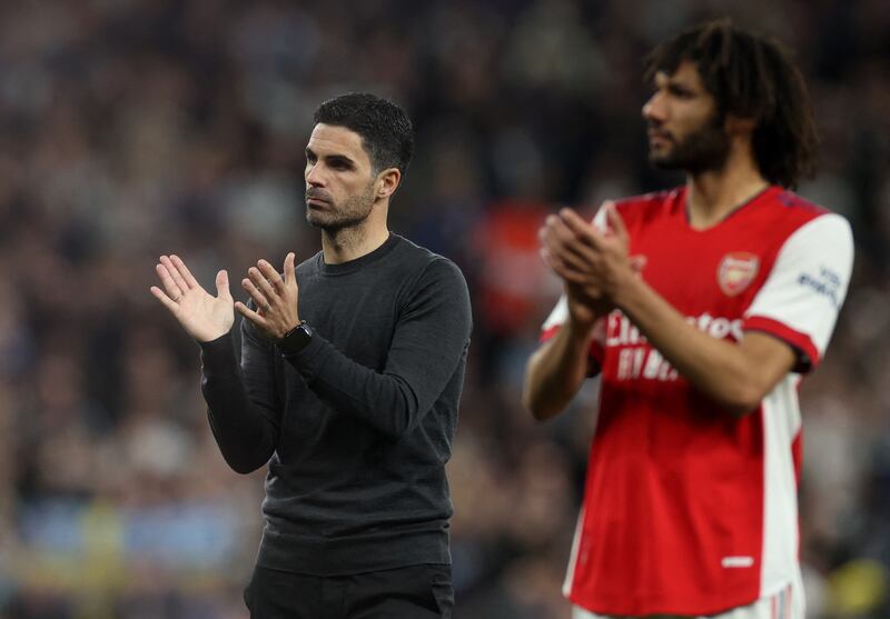 Arsenal manager Mikel Arteta and Mohamed Elneny after the final whistle. Action Images