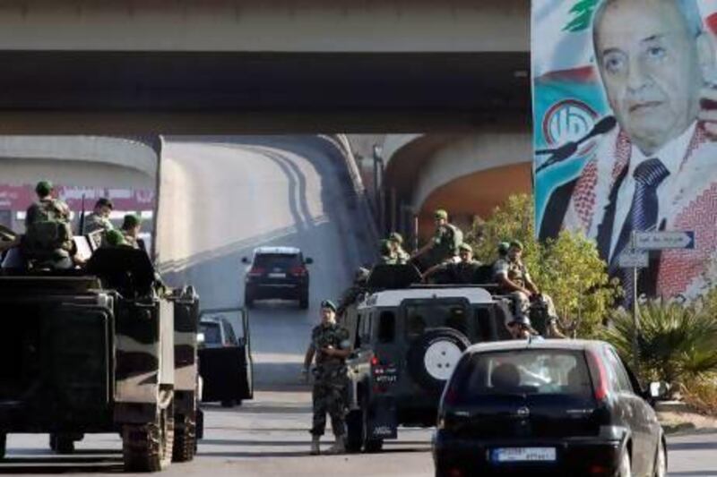 Lebanese army troops patrol the airport highway on the southern outskirts of Beirut following the kidnapping.